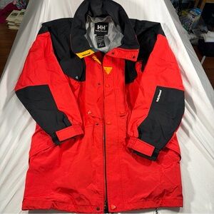Vintage Helly Hansen Equipe ski jacket in red, black, and yellow Size XL